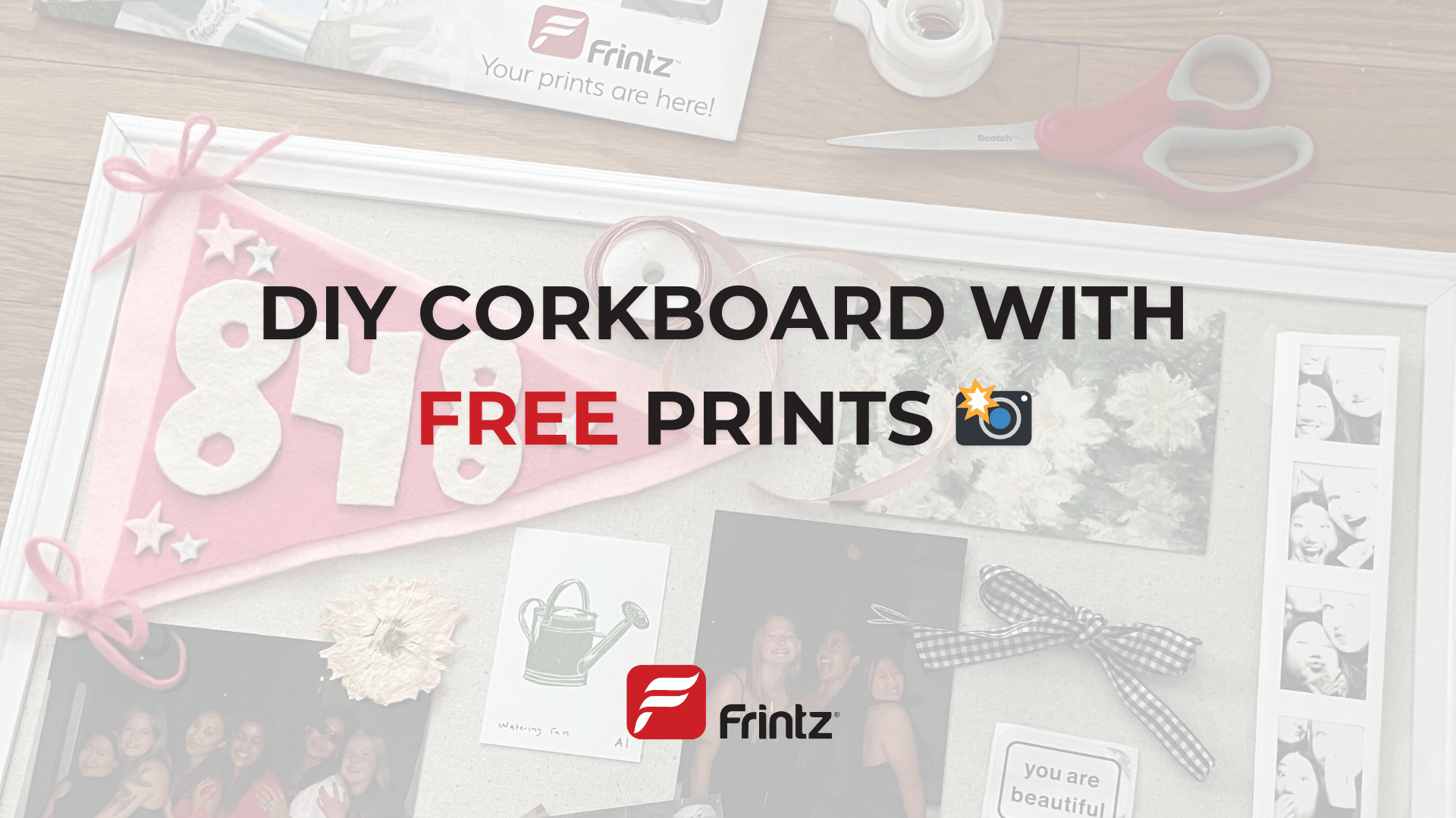 A slightly transparent background image of a Frintz envelope with scissors, tape, and ribbon beside a corkboard layed out with cute decor and photos